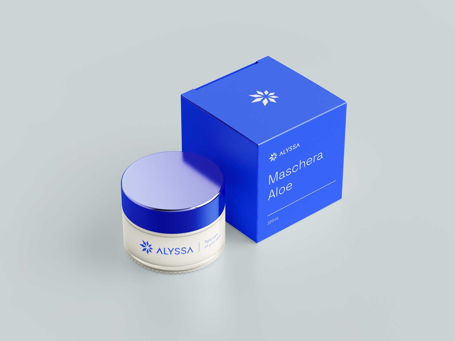 Pot met aloëmasker van Alyssa naast de felblauwe productverpakking
