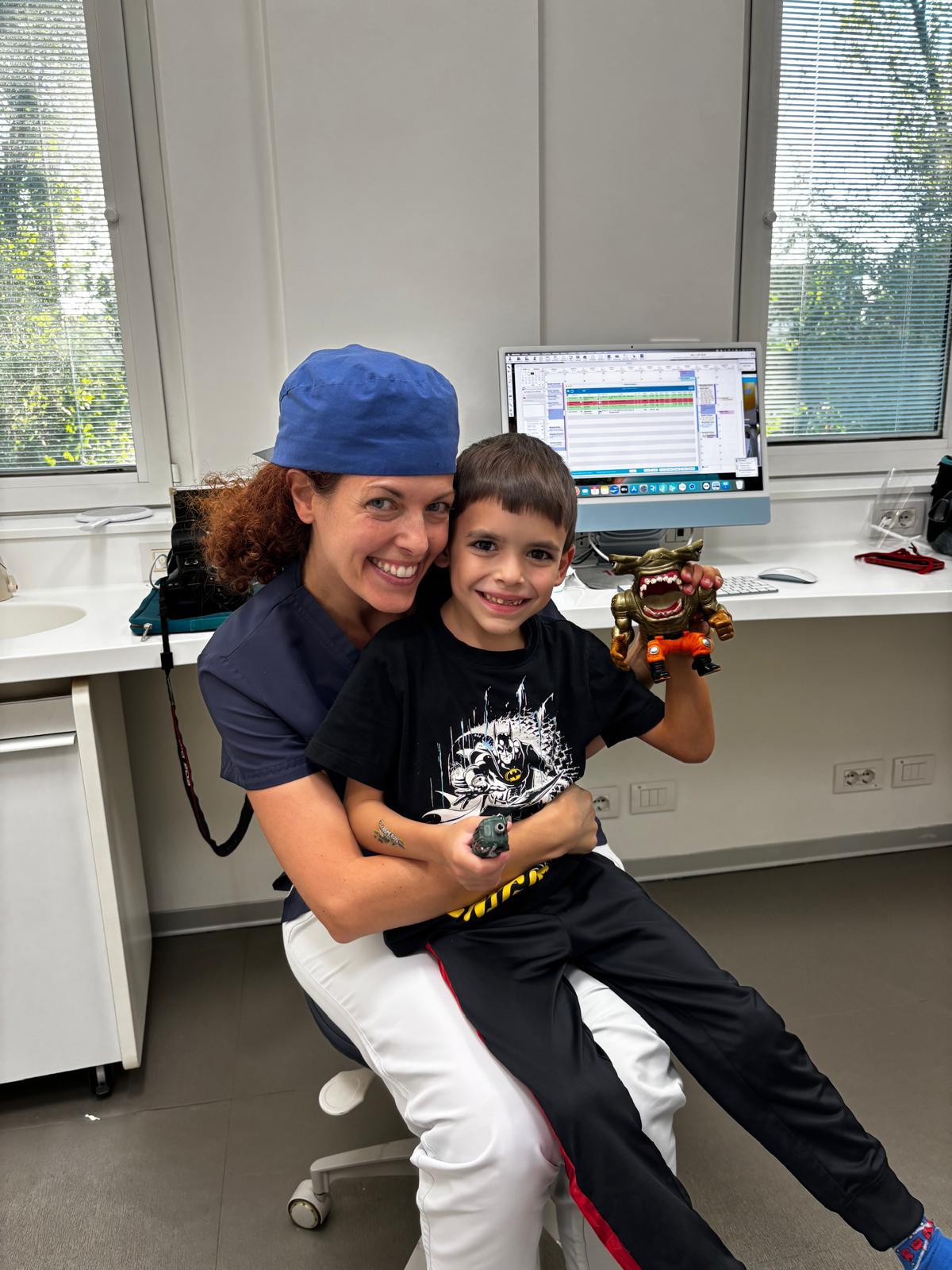A Studio Rao dentist with a young patient inside the clinic